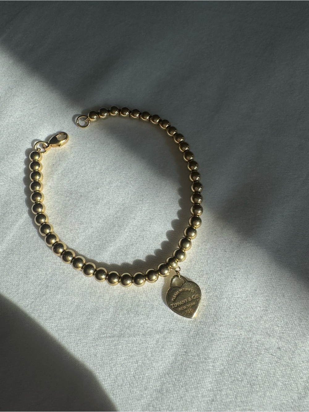 Tiffany and Co. Return to Tiffany 18k Gold 4mm beaded bracelet.  6.5 inches long